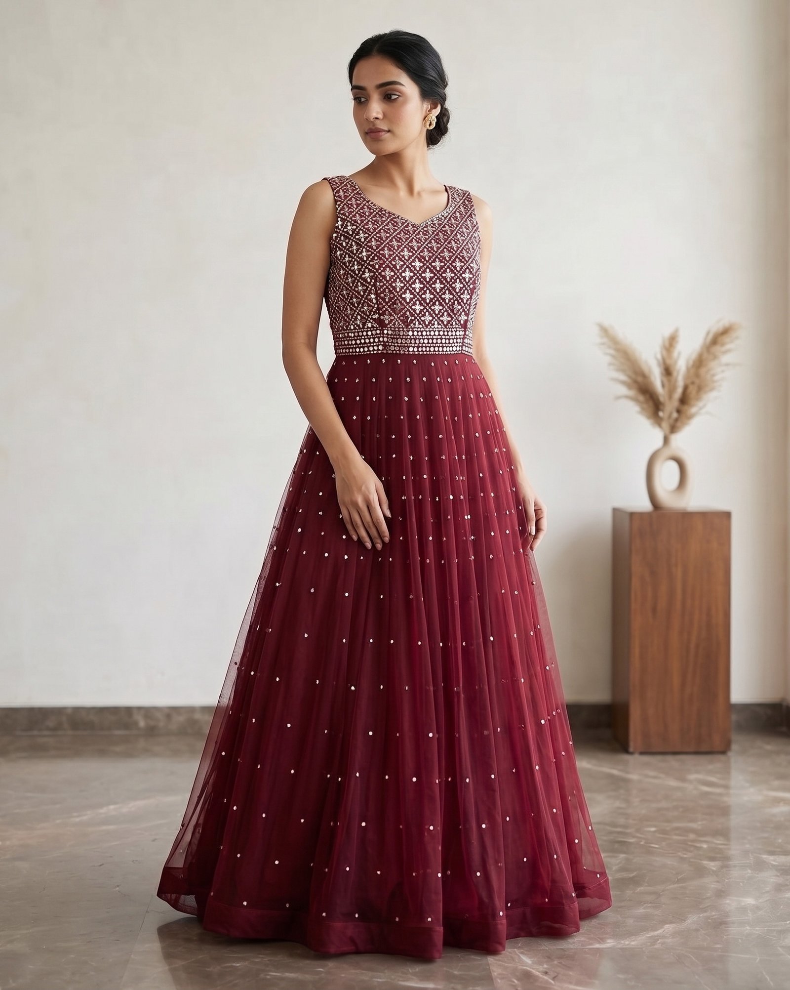 Rajshri Fashions Regal Maroon Sequined Net Floor-Length Gown