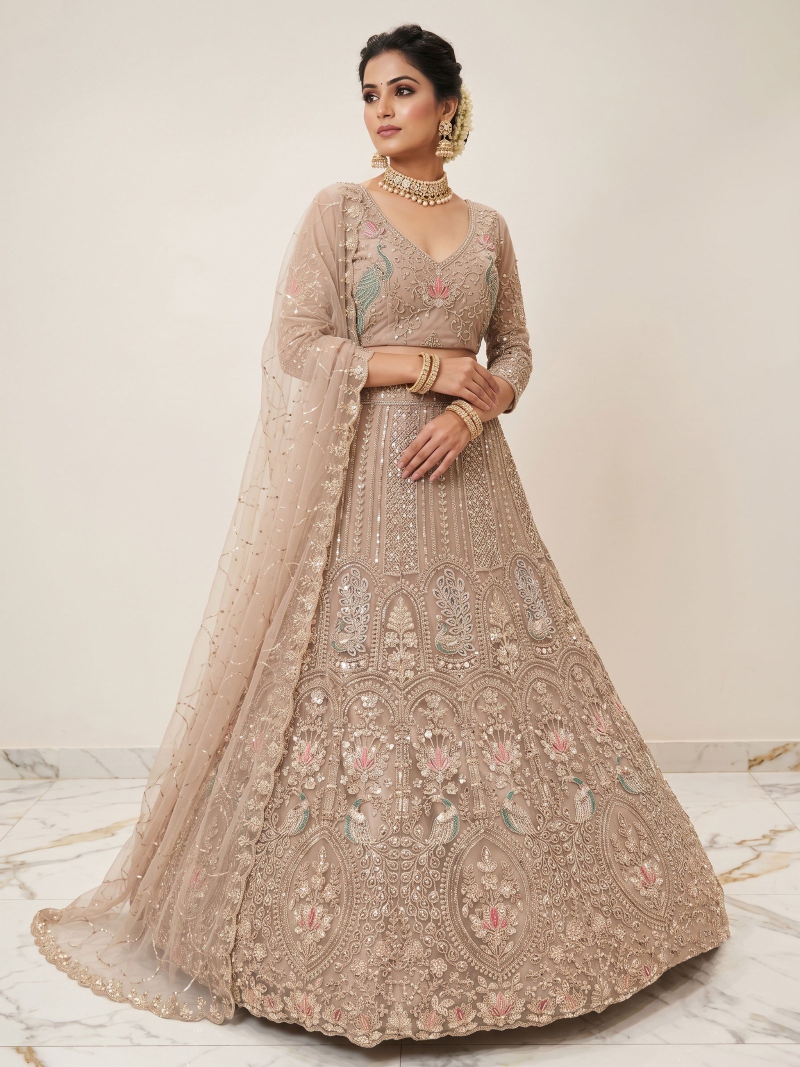 Rajshri Fashions Champagne Beige Embroidered Peacock Motif Bridal Lehenga