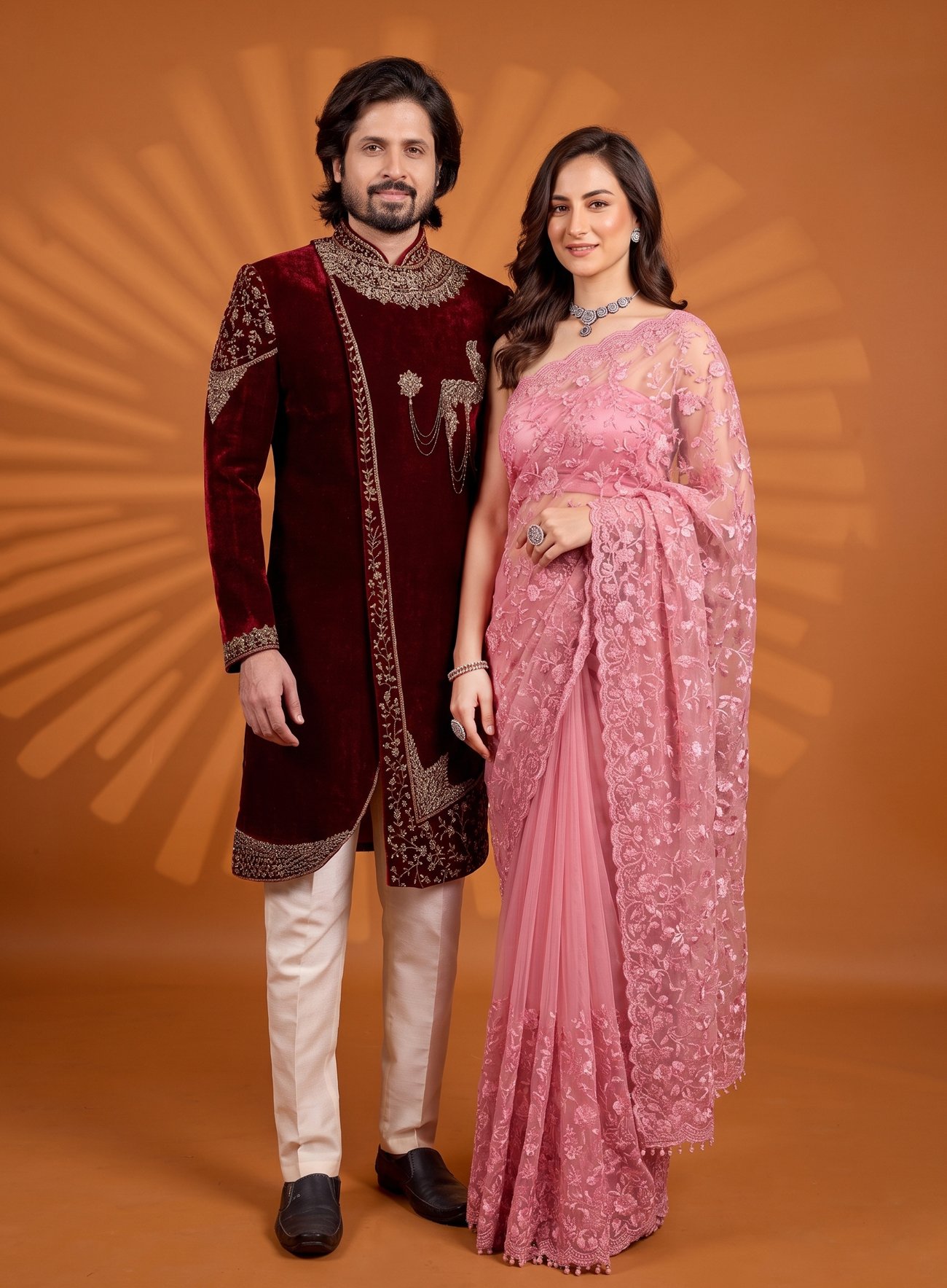 Rajshri Fashions Regal Maroon Velvet Sherwani and Blush Pink Embroidered Net Saree Couple Set - Rajshri Fashions Sowcarpet Chennai